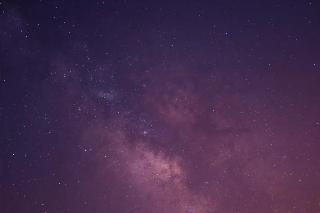 a moody night sky, stars, or an abstract purple/indigo